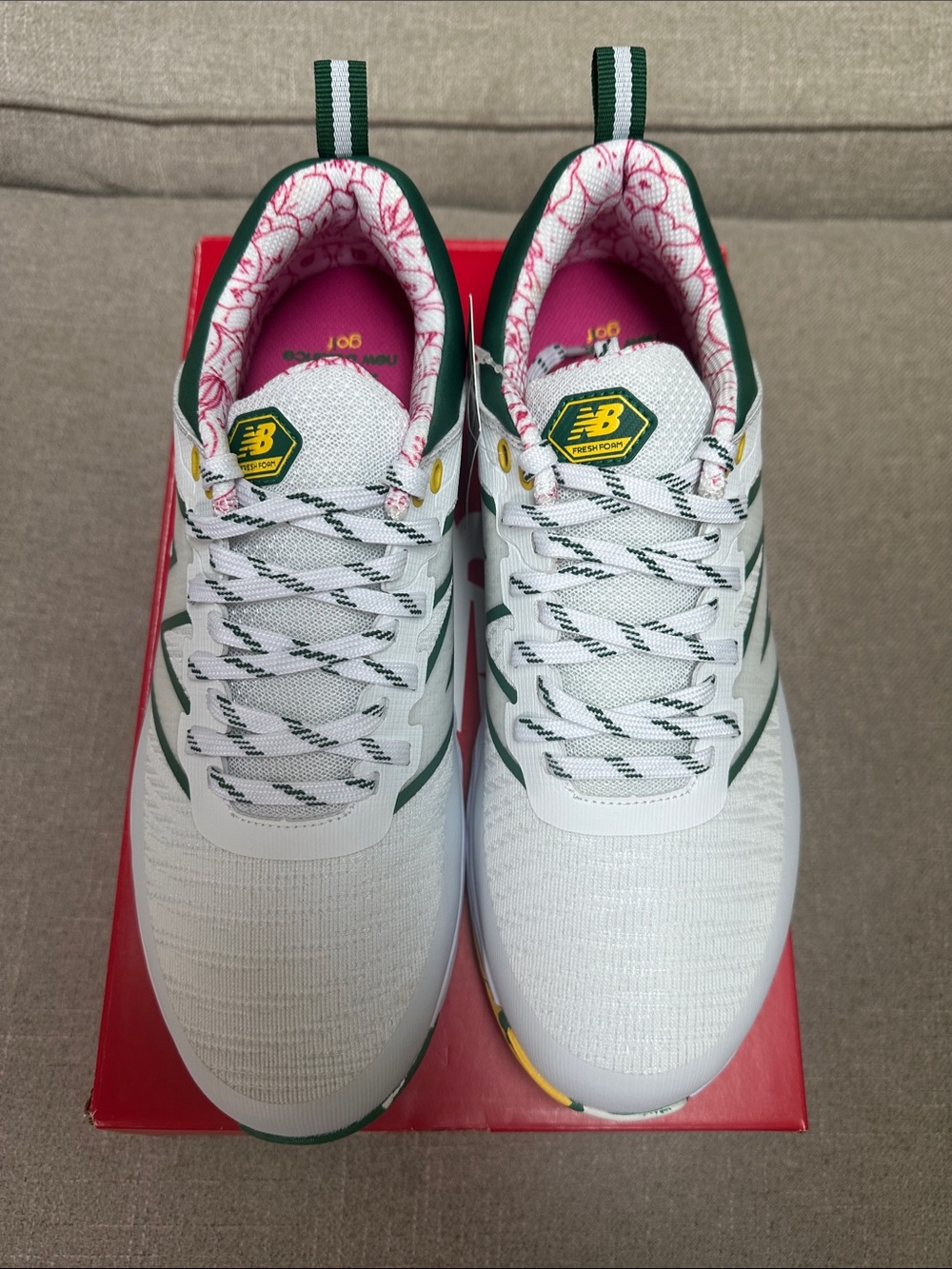 New Balance White Athletic Sneakers with Green Trim and Pink Lining